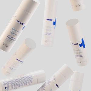 emuaid barrier repair hydrating face cream bottles floating
