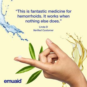 hand applying skincare cream with water and leaves background