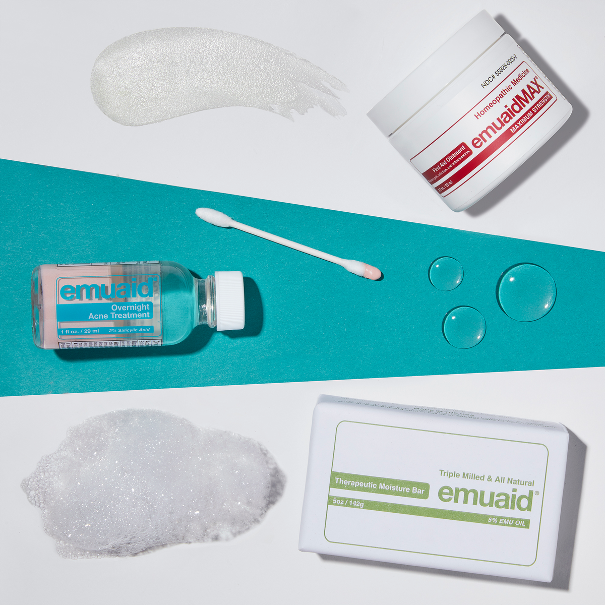 Emuaid skincare products including emuaidmax ointment, overnight acne treatment and therapeutic moisture bar on a blue and white background