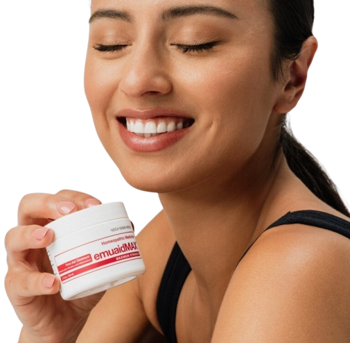An image of a smiling woman holding EMUAIDMAX jar