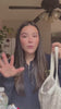Video of woman packing EMUAID products for travel