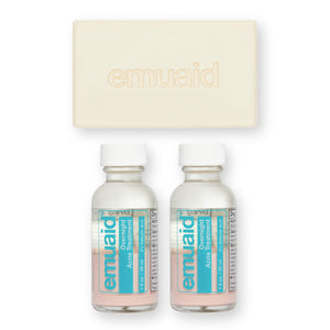 This is a picture of 2 bottles of EMUAID® Overnight Acne Treatment and the EMUAID® Therapeutic Moisture Bar.