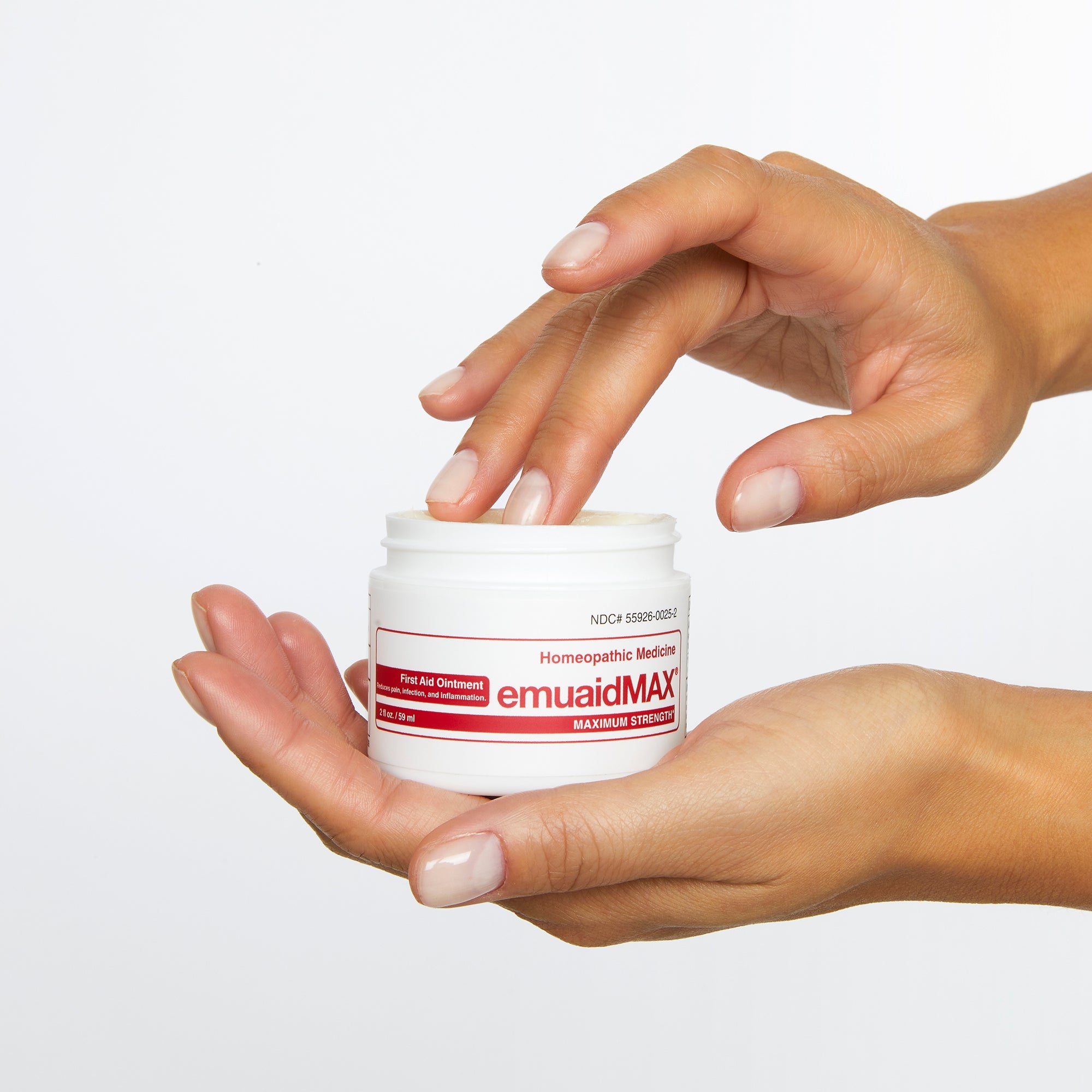 hand with emuaid cream